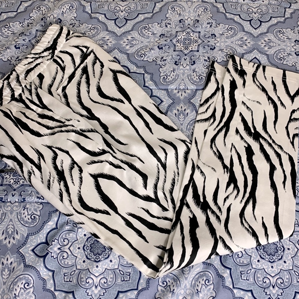 Mens INC causal pants, zebra print , size small .